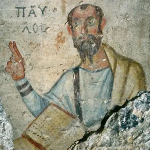 An ancient painting depicts an early Christian figure identified as Paul, holding a text, with the Greek letters "ΠΑΥΛΟΣ" written above. The bearded figure is dressed in a robe. 

The History of Genesis: From Eden to Egypt offers an in-depth exploration of biblical narratives, providing context to artifacts such as this remarkable painting.